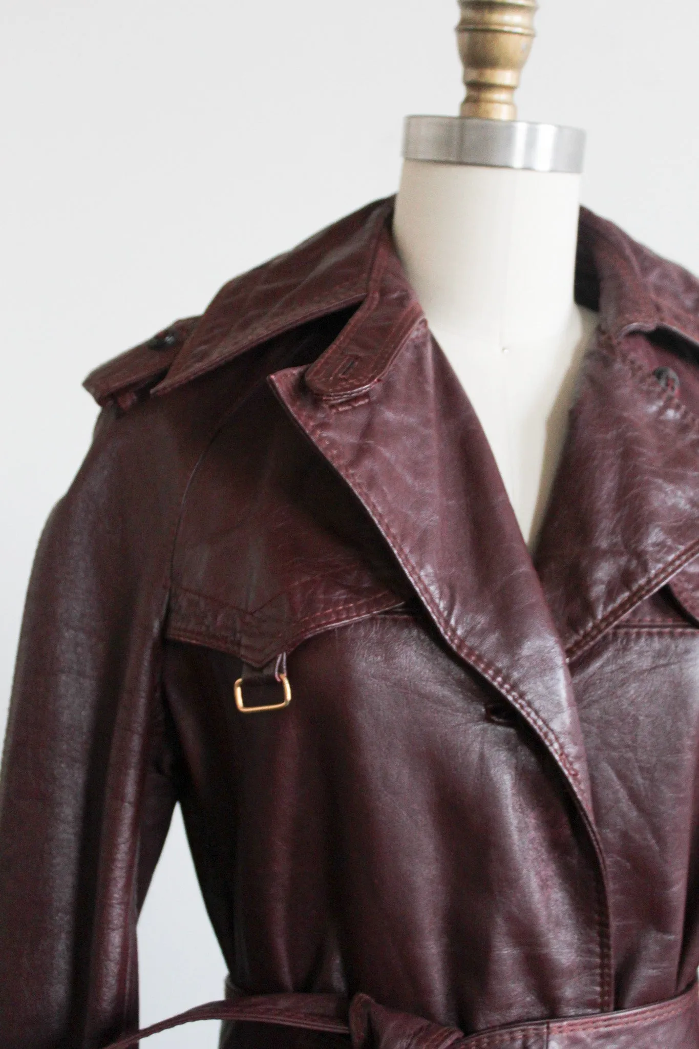 oxblood leather trench